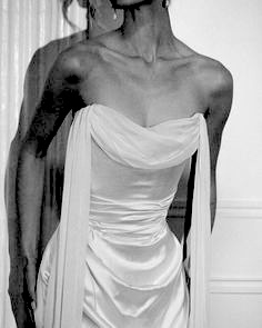 Close detail of satin bridal gown
